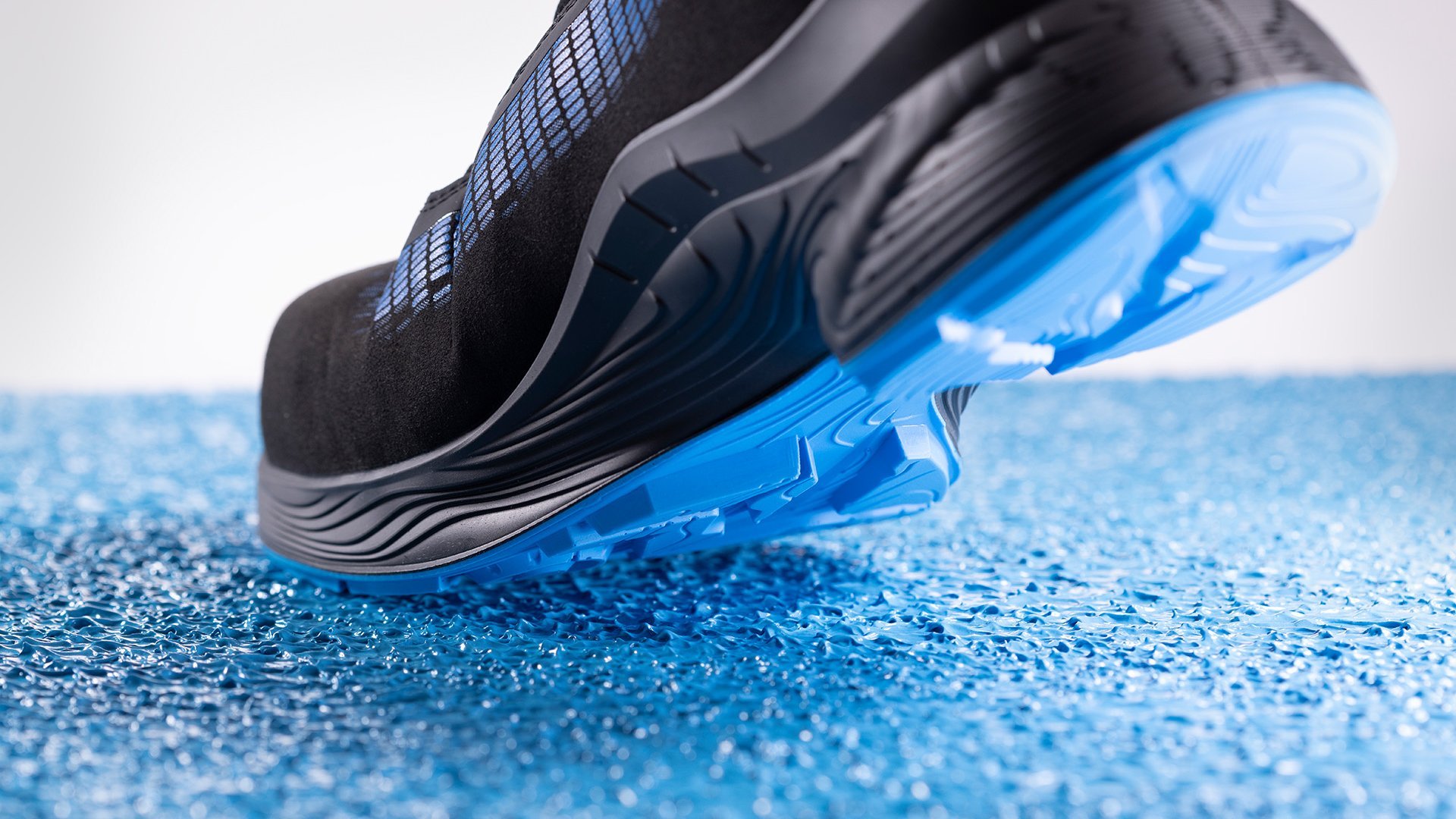Floor coatings: shoe on blue floor